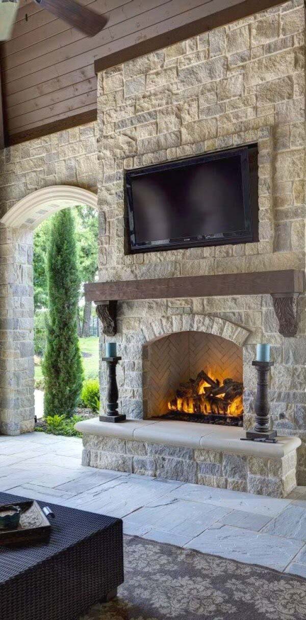 Natural Stone Fireplace Warms Outside Space #fireplace #design #decorhomeideas