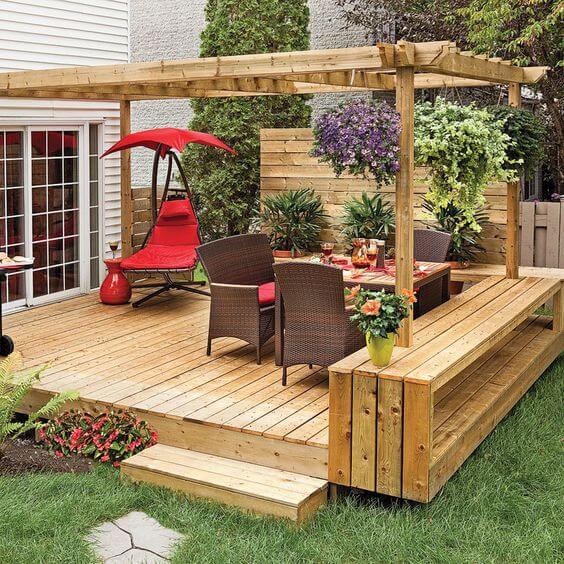 Open Space With Wooden Floating Deck With Woven Table and Chairs #deckideas #backyard #decorhomeideas