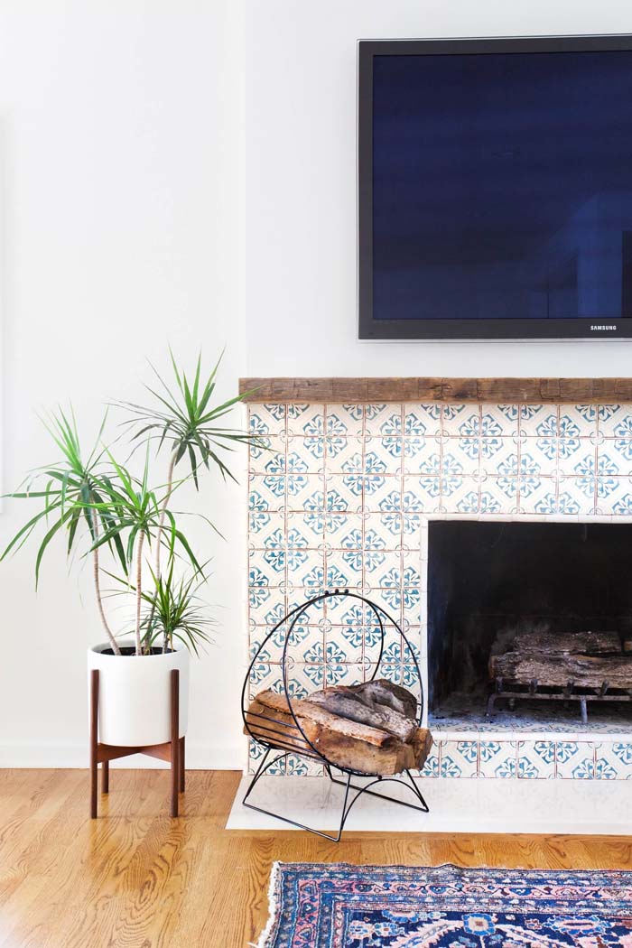 Painted Tile Creates Delicate Highlight #fireplace #design #decorhomeideas