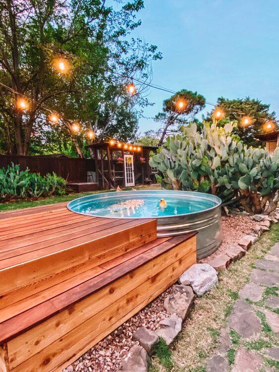 Stock Tank Pool Deck #deckideas #backyard #decorhomeideas