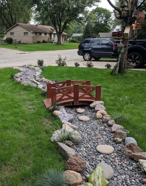 A French Drain That Tells a Story #dryriverbed #drycreek #decorhomeideas