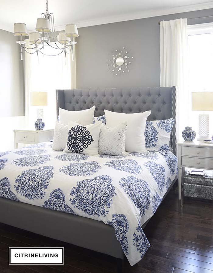 Bright, Cool Blue Patterns Add a Lush Touch to this Sleek Grey Bedframe #greybedroom #decorhomeideas