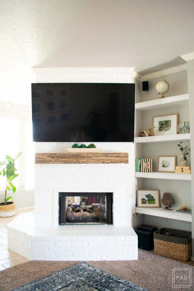 Bright White Minimalist Brick Fireplace Makeover #brickfireplace #decorhomeideas