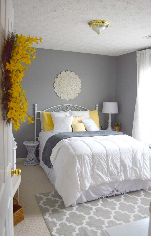 Bursts of Yellow Provide Warm Energy in these Soft Grey Bedroom #greybedroom #decorhomeideas