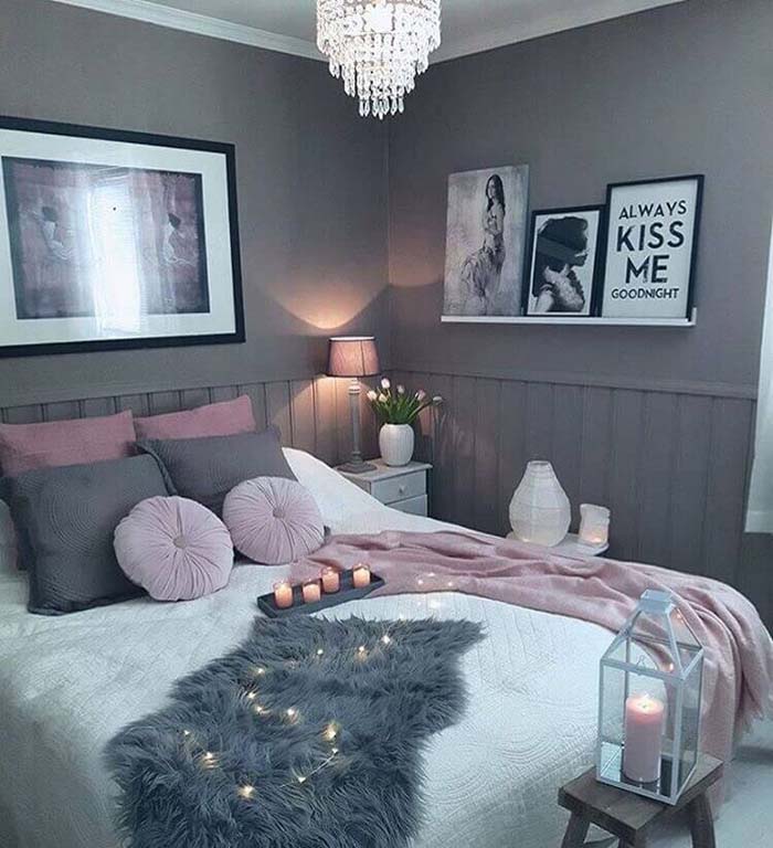 Delicate Lighting and Dusty Pinks Feminize this Grey Bedroom #greybedroom #decorhomeideas