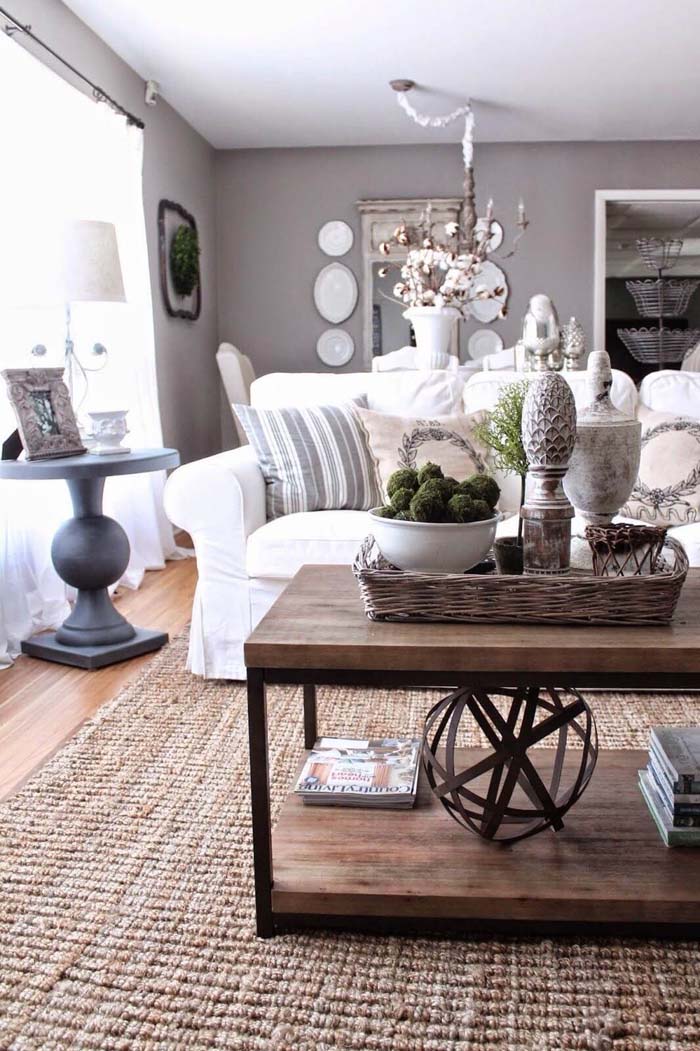Double Decker Display of Geometric Art and Natural Accents #coffeetabledecor #decorhomeideas