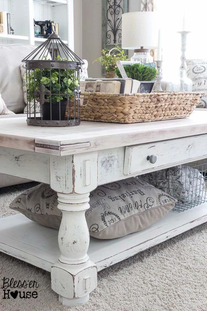 Earthy White-washed Table and Clutter-catching Raffia Basket #coffeetabledecor #decorhomeideas