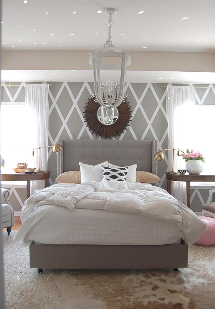 Geometric Patterns and Pastels Play Nicely in this Lush Grey Bedroom #greybedroom #decorhomeideas