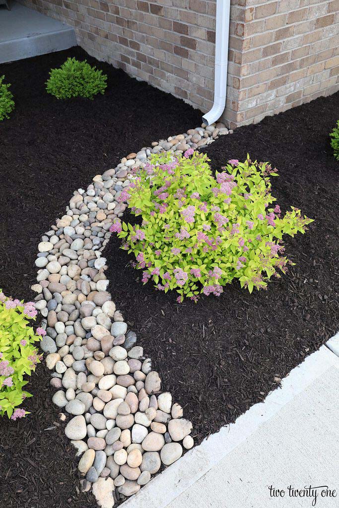 Mulch Adds to a Creek Bed Feature #blackmulch #landscaping #decorhomeideas