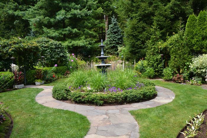 Tall Fountain Adds Interest to Path #waterfountain #landscaping #decorhomeideas