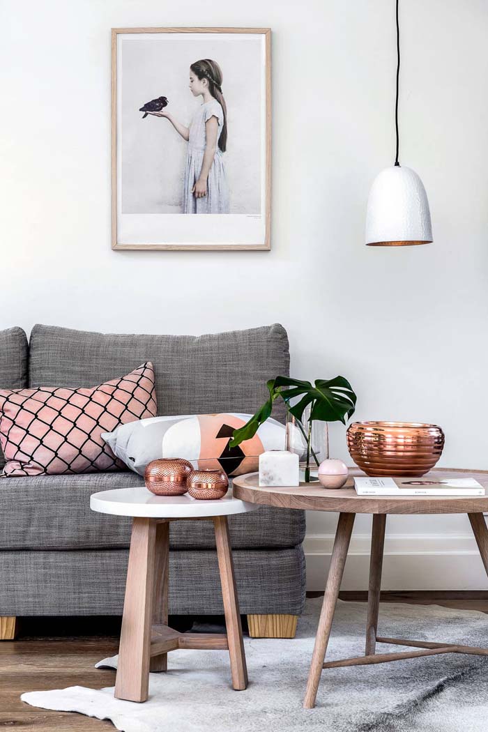 Trendy Copper Vessels Paired with Single Stem Foliage Arrangements #coffeetabledecor #decorhomeideas