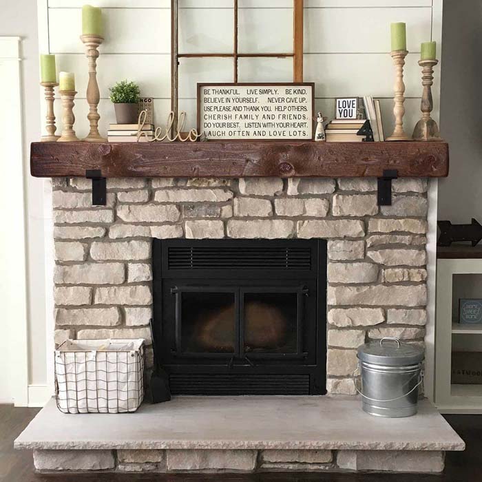 Unique Barn Beam Mantle with Black Metal Brackets #brickfireplace #decorhomeideas