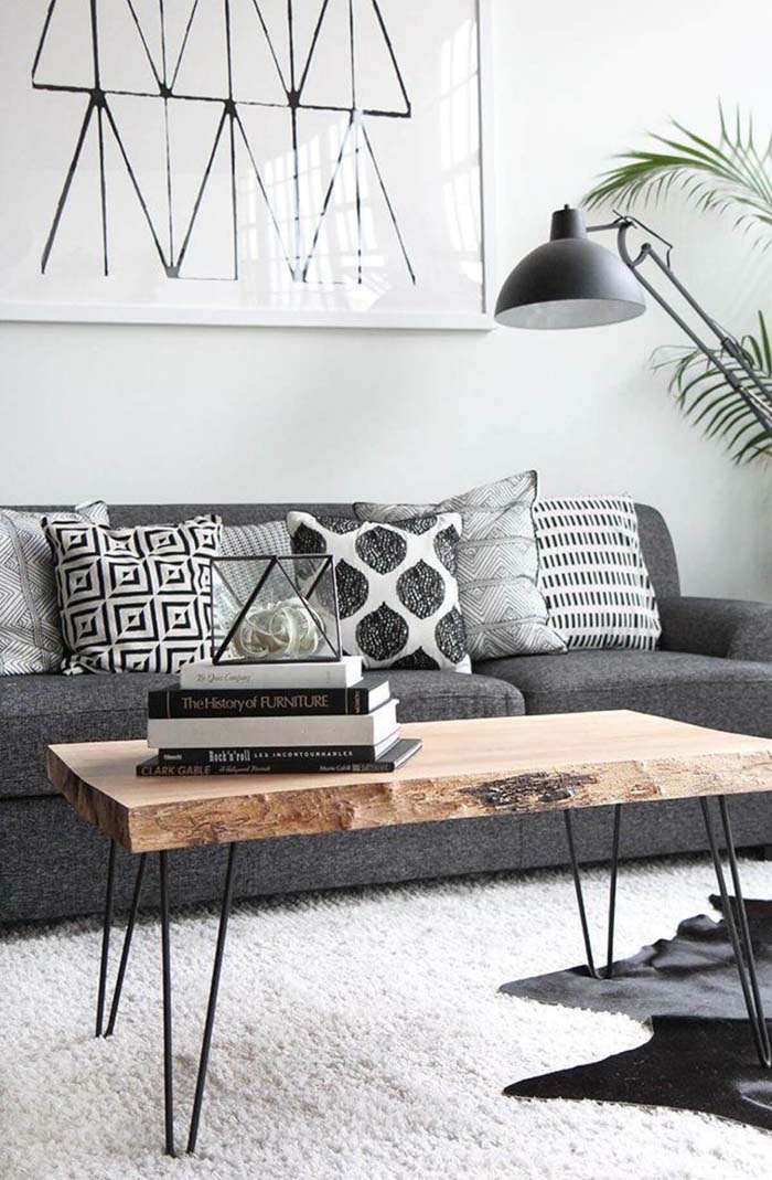 Wood-slab Statement Table and Black and White Book Display #coffeetabledecor #decorhomeideas