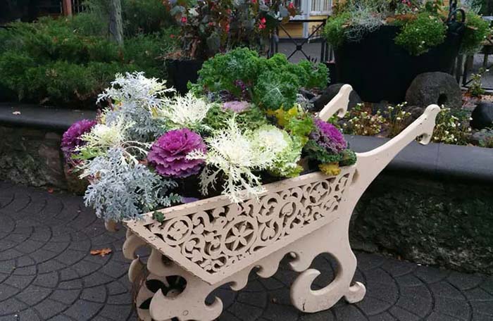 An Intricate Stone Wheelbarrow for Winter Plants #decorhomeideas
