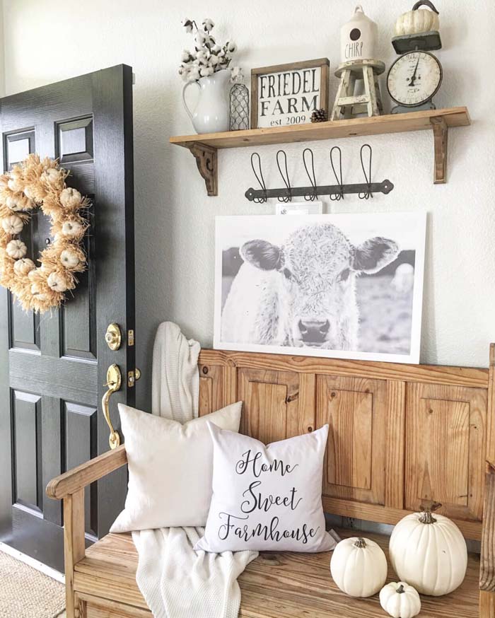 Oak Bench, White Pumpkins, and Cow Prints #decorhomeideas