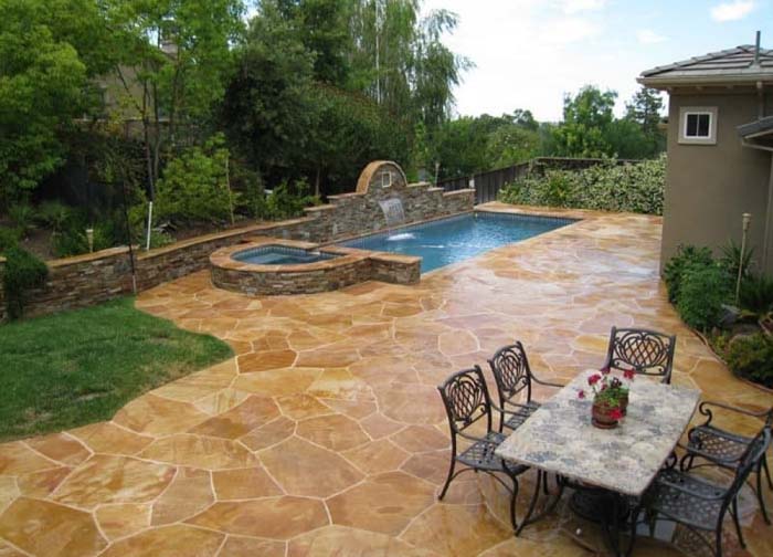 Pool Deck With a Natural Stone Overlay