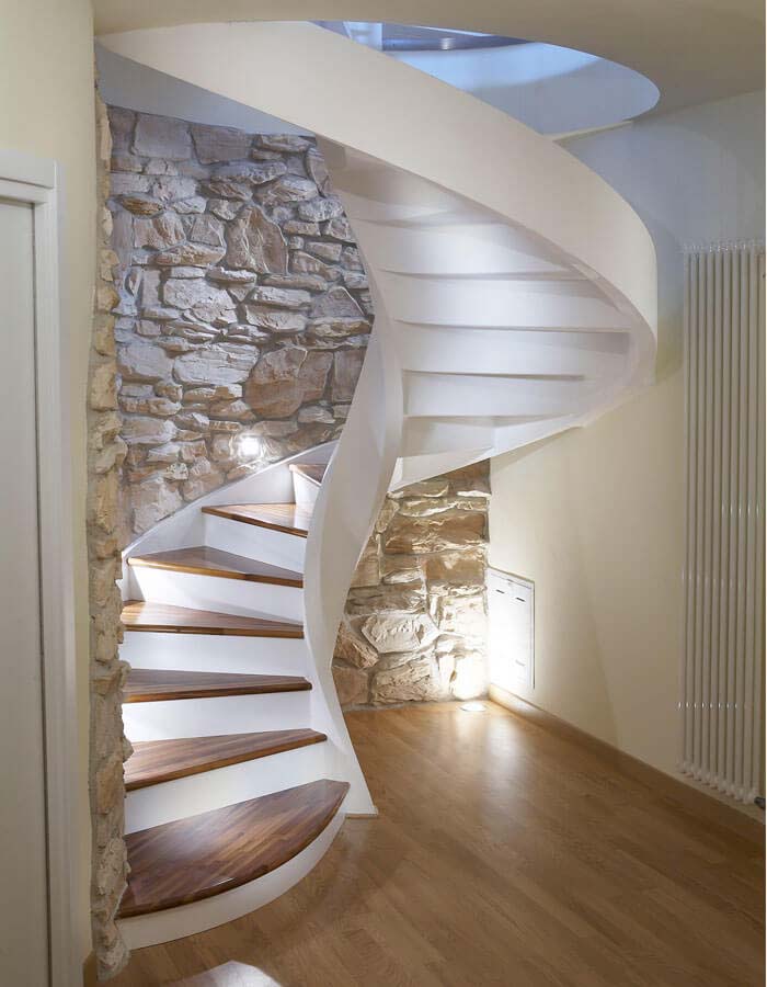 Natural Wall In Combination With Modern Spiral Staircase