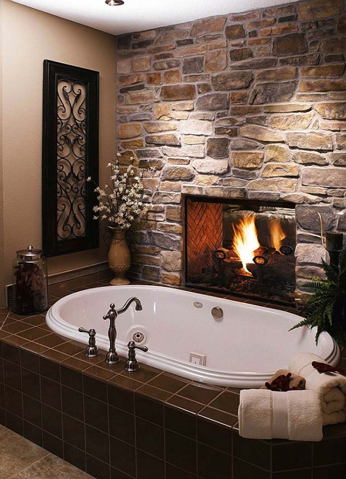 Built-In Fireplace In Stone Bathroom Wall