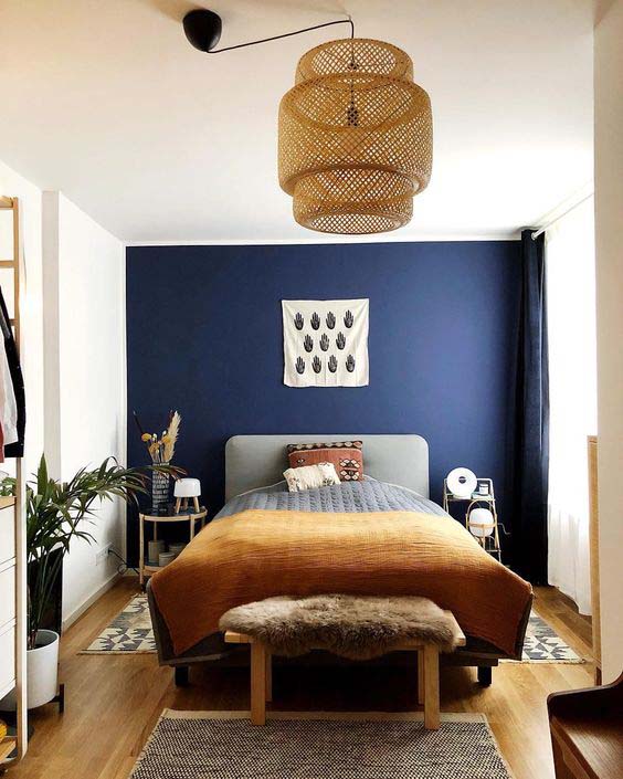 Navy Accent Wall With Earthy Toned Accents