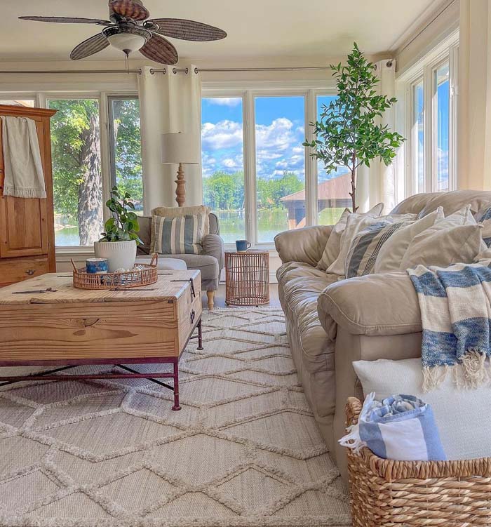 Striped Fabric In Pale Colors And Rattan Furniture