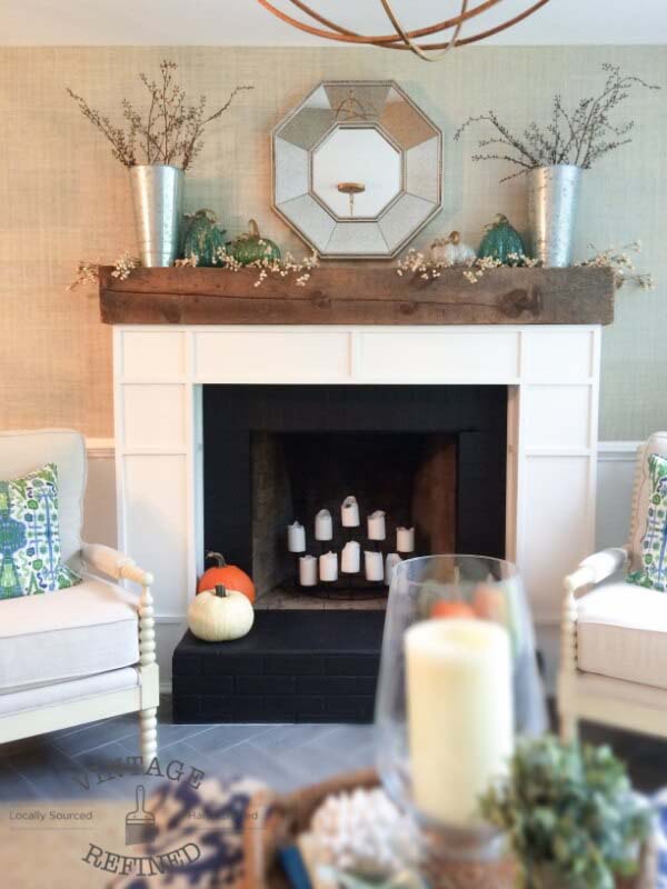 Reclaimed Wood Mantle Over White Paneling