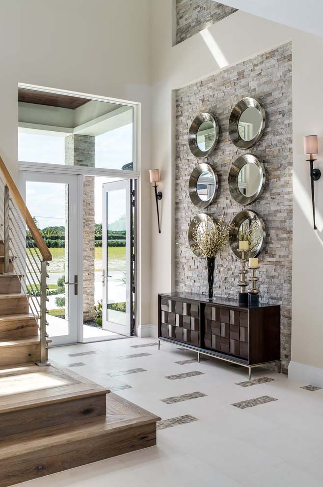 Modern Entryway With Grey Stone Accent Wall