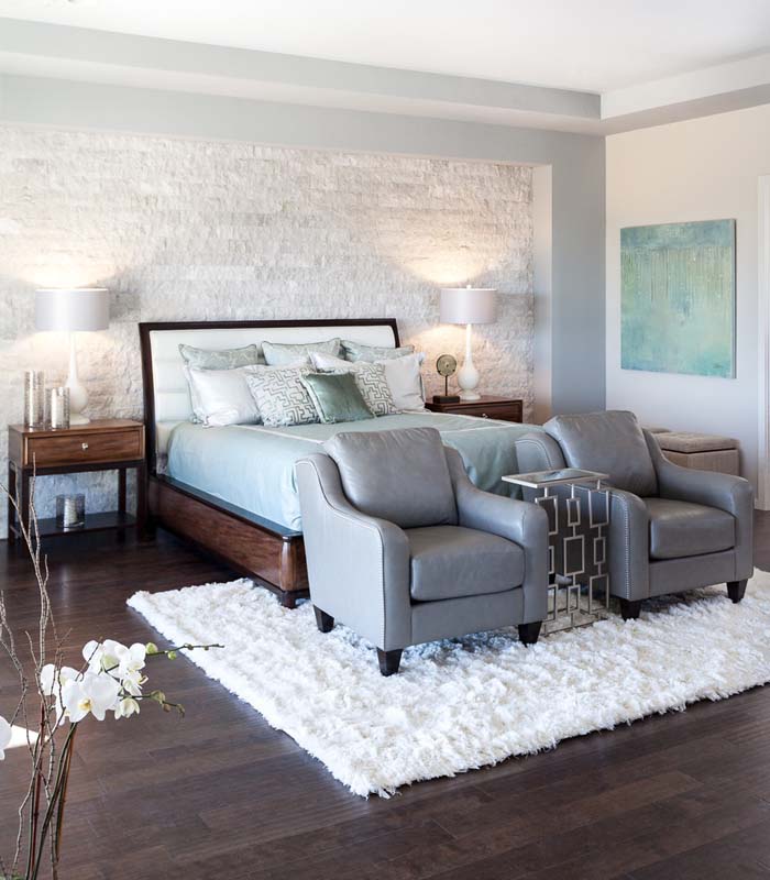 Airy Bedroom With White Stone Accent Wall