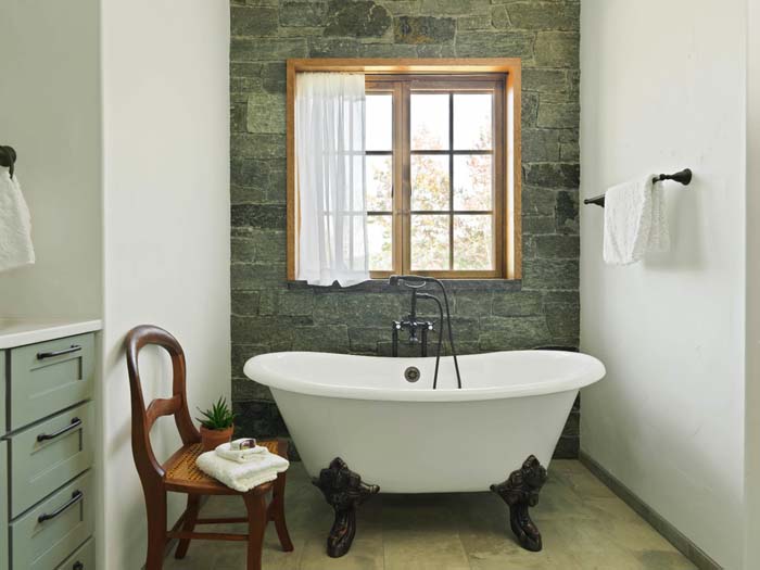 Small Farmhouse Bathroom With A Natural Stone Accent Wall