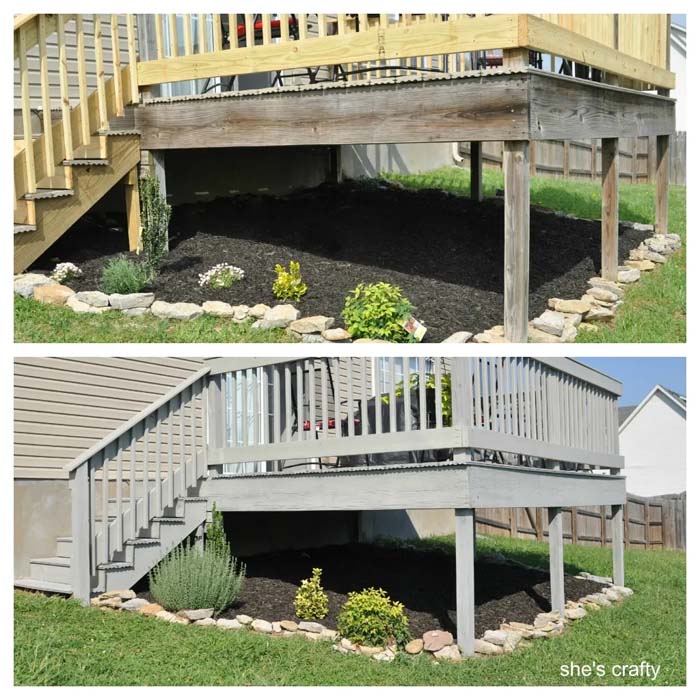 A Low Deck Covered With Black Mulch