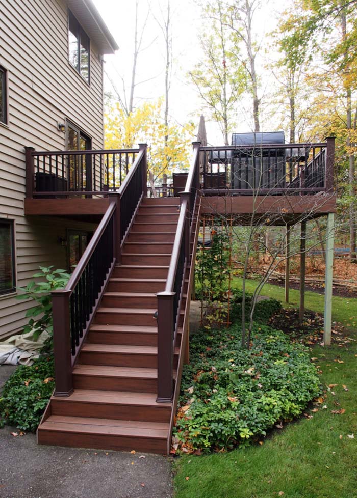 Classic Under Deck Landscaping Idea Has Lush Greenery