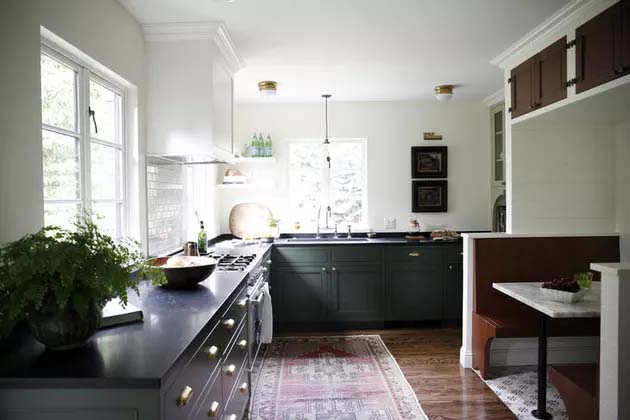 hunter green kitchen cabinets black granite countertop