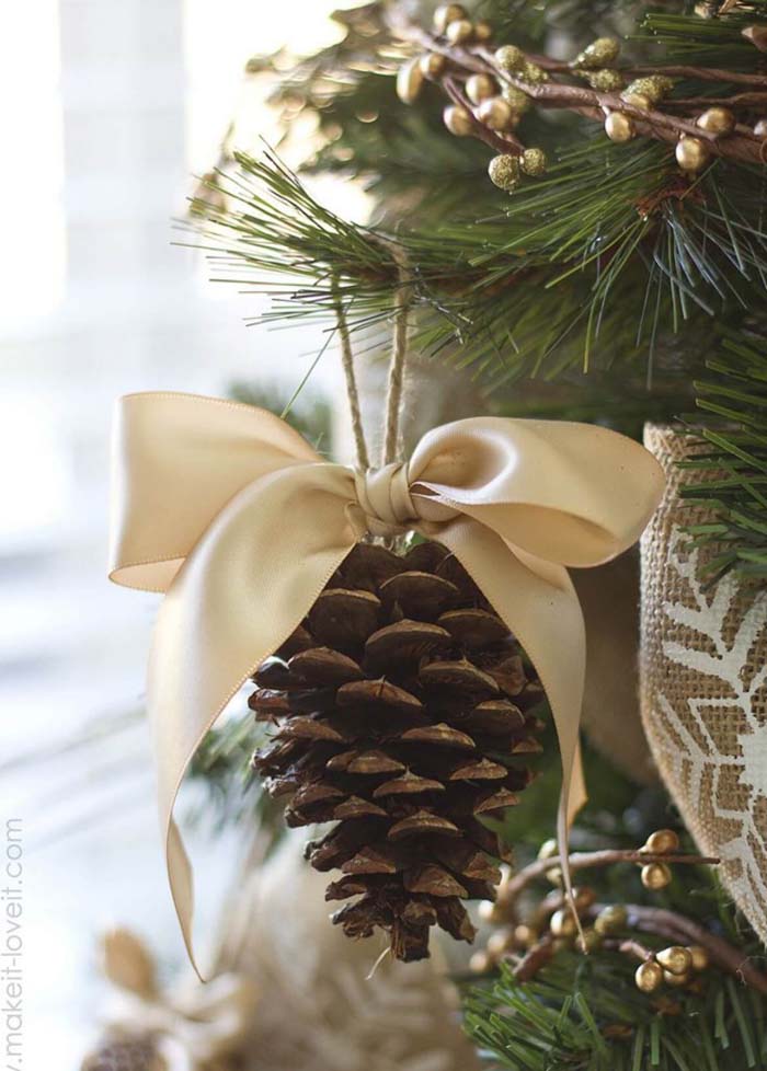 Pine Cone Ornament With An Elegant Bow