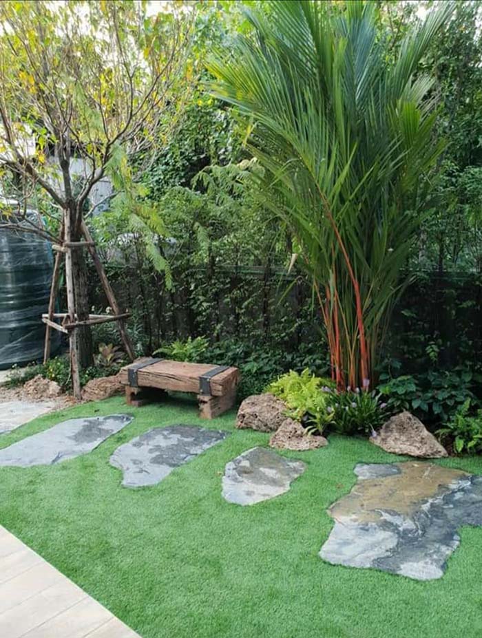 A Seating Corner Near The Garden Walkway