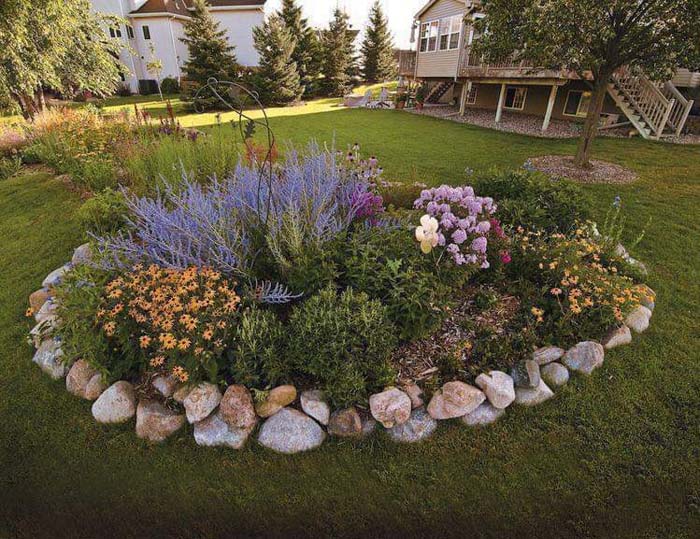 Round Flower Bed Gathering Plenty of Plant Varieties