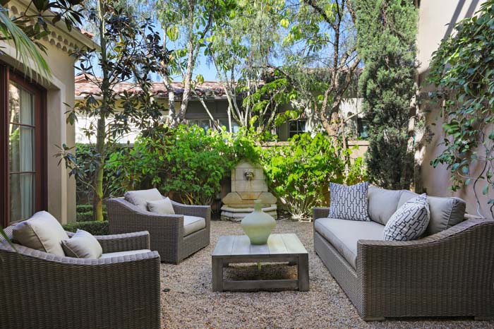 Pea Gravel Patio With A Water Feature