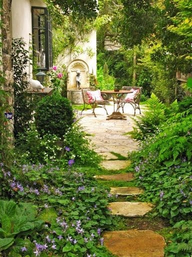 A Rustic House With Stone Pathway