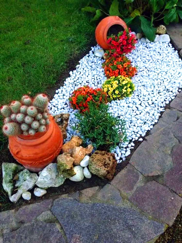 paisagens Fluxo de flores em um canteiro de pedras