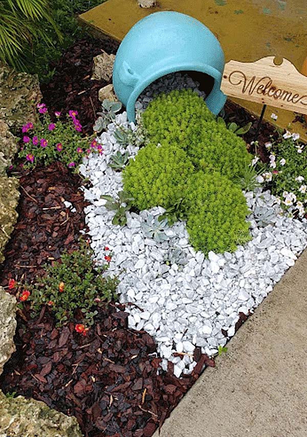 Front Porch Garden With Mulch And Pebbles