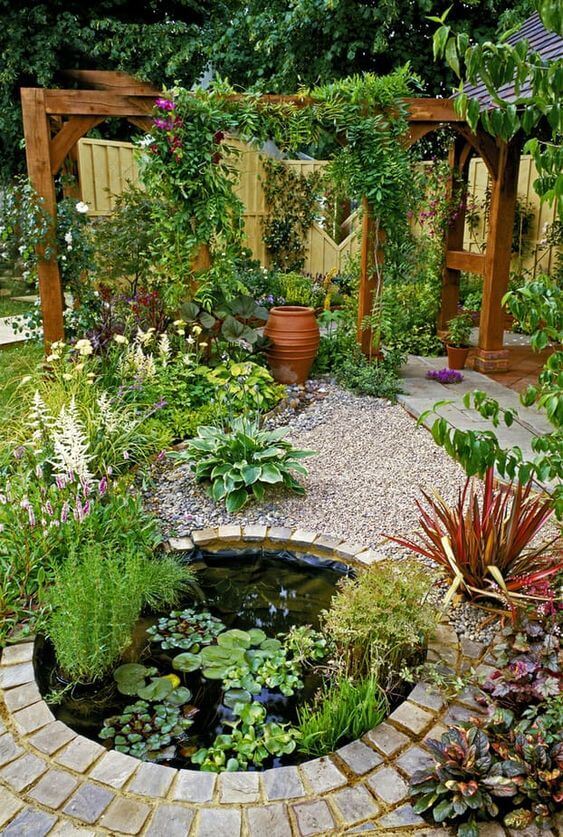  A Small Rock Garden with Green Space and Pergola Design