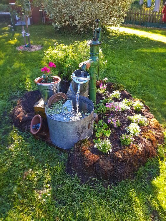 Displaying Antique Pumps In Your Garden
