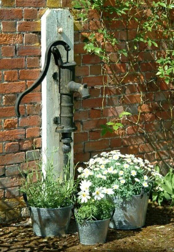 Rustic Garden With Old Well Pump