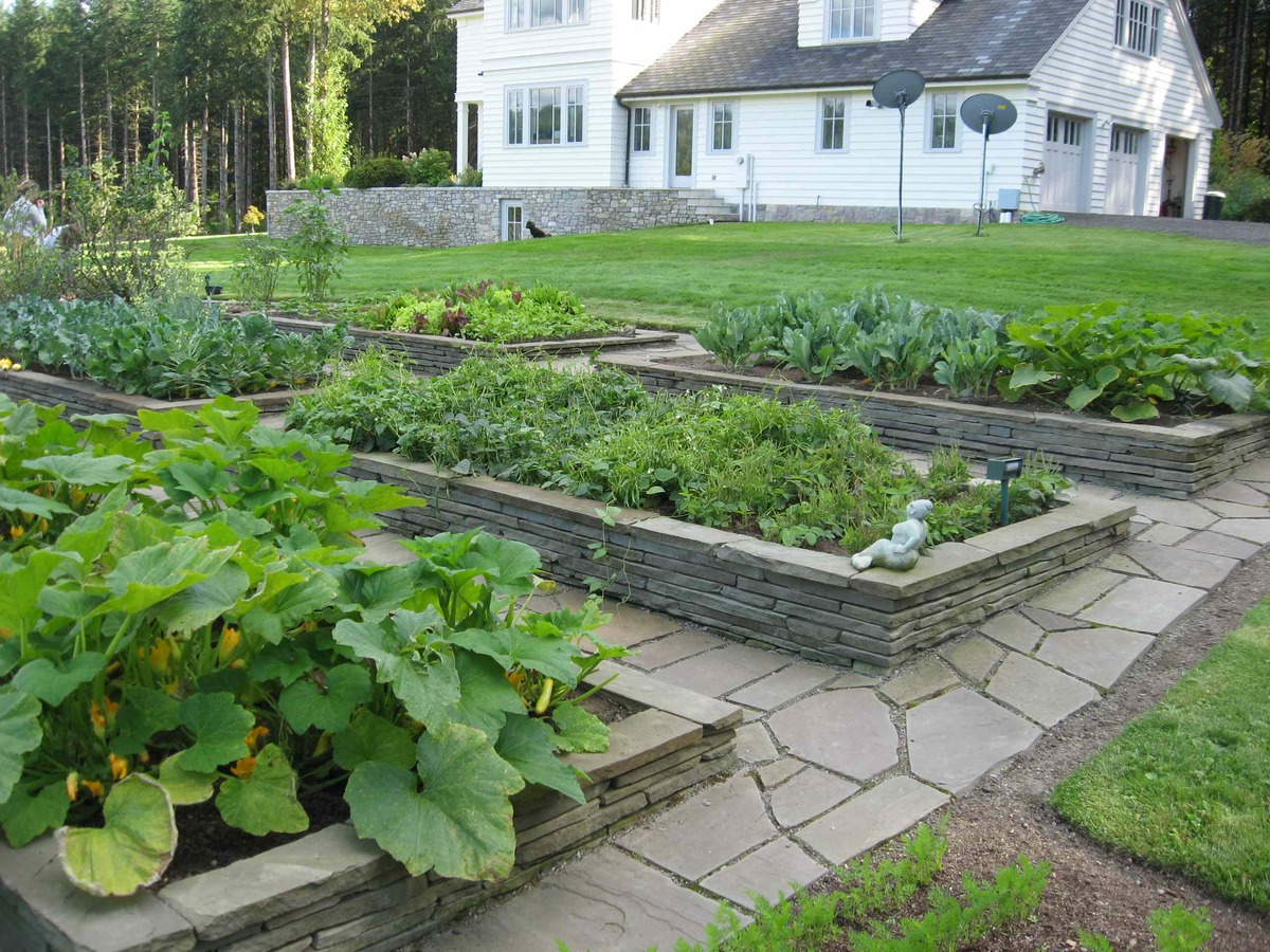 15 raised flower beds along fence 11