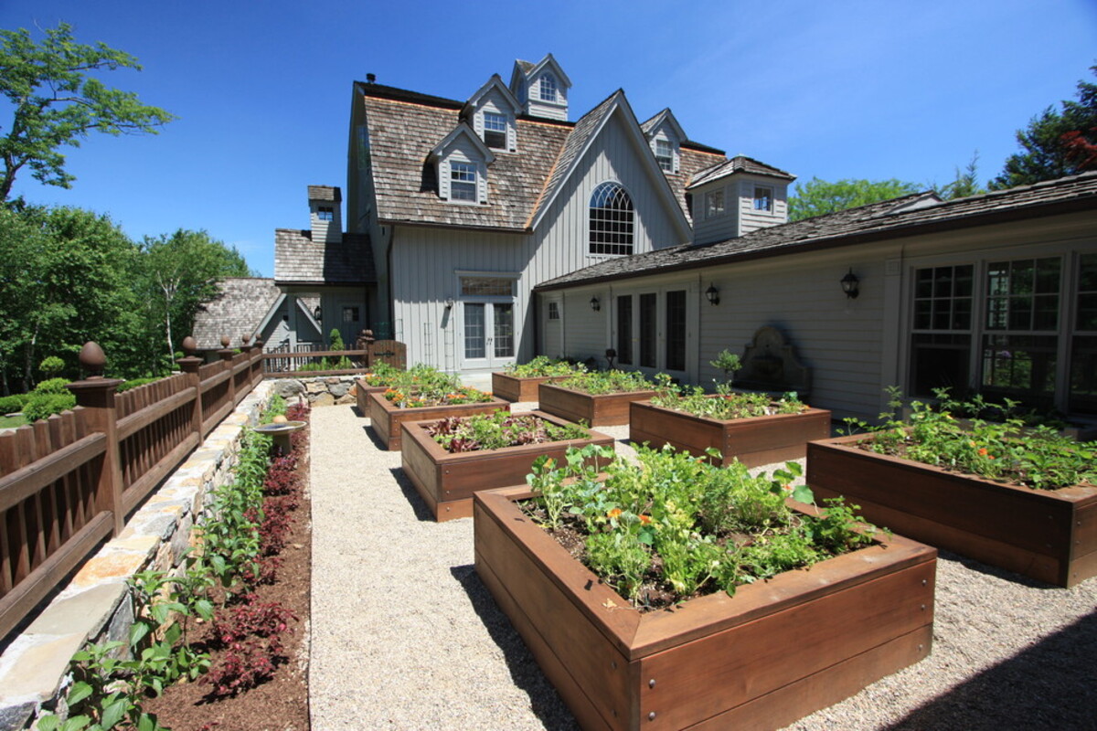 15 raised flower beds along fence 4