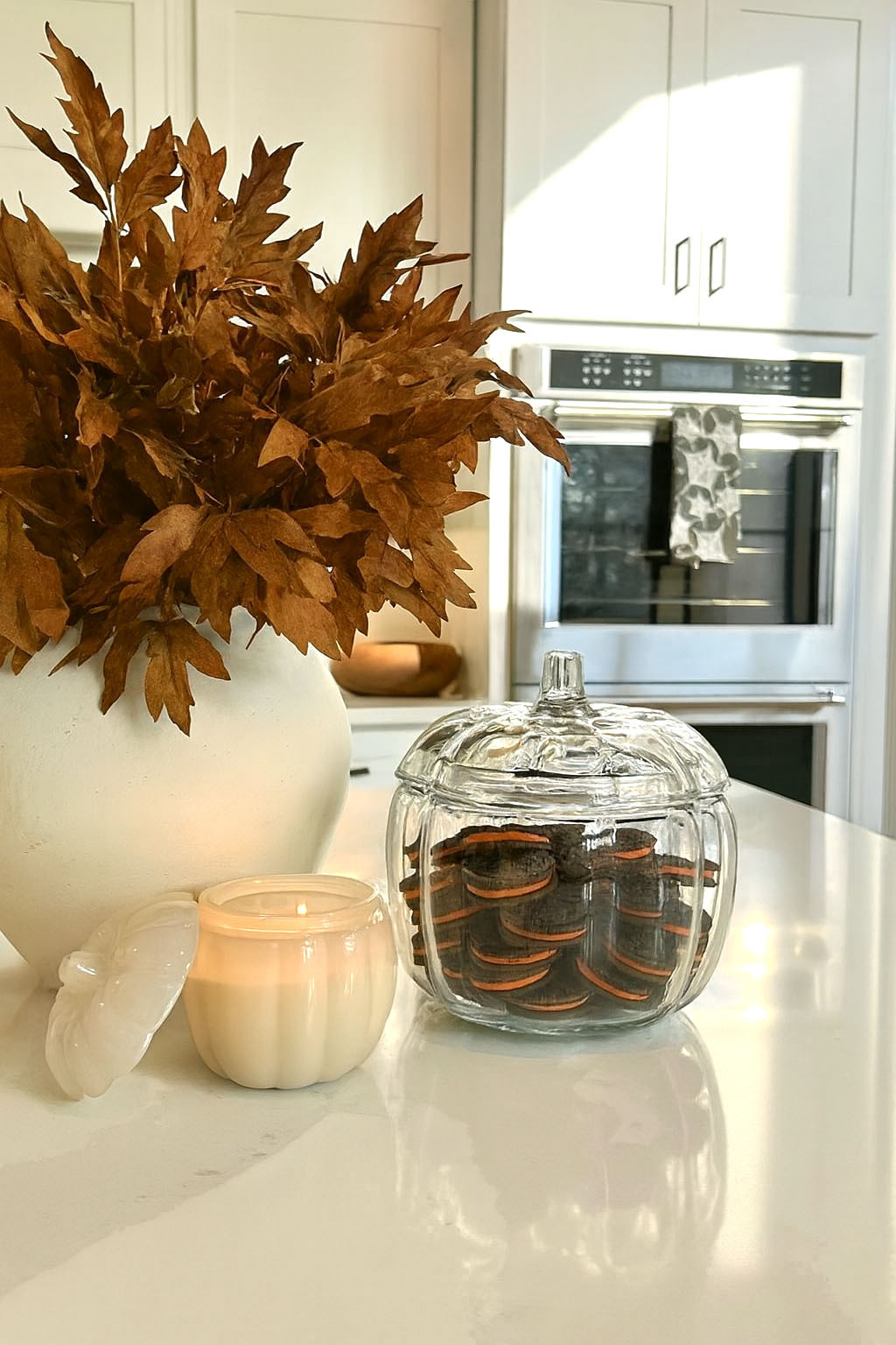 Cozy Fall Kitchen Decor Idea with Pumpkin Jar & Brown Foliage